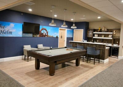 Charter Senior Living of Oak Openings, IL lounge and bar with a racked pool table