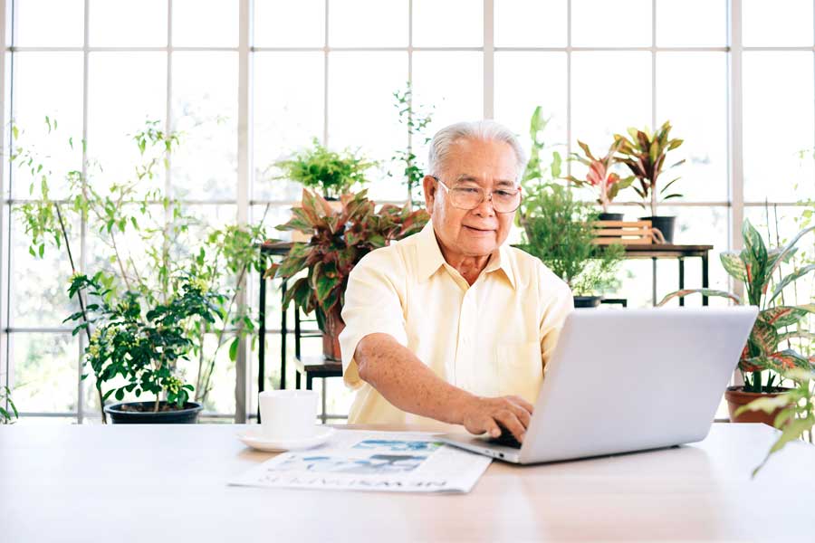 iStock-1279654083 Senior Aged Woman with Tablet Filling out Aging Choices Checklist